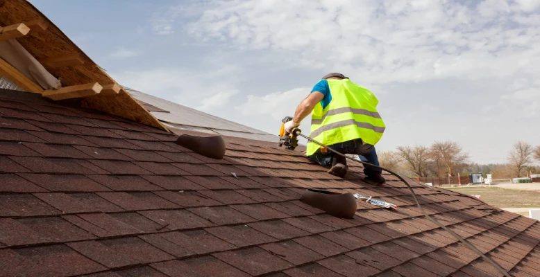 Routine roof maintenance visit with a technician checking seams and penetrations
