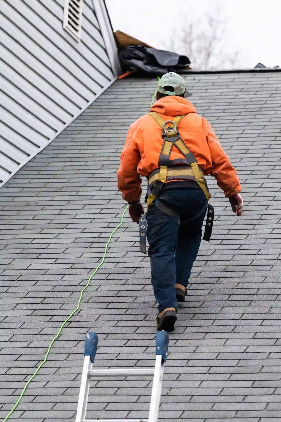 New roof replacement nearing completion on a steep slope